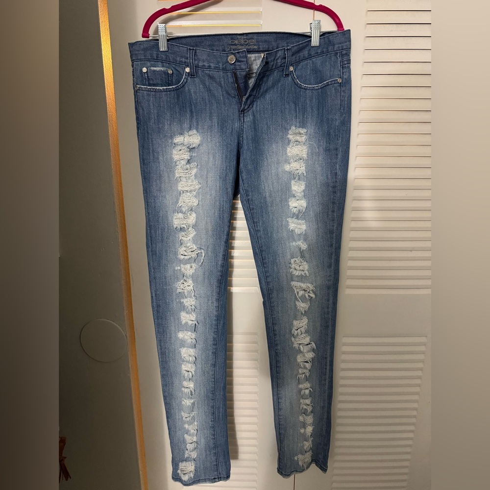 Bebe blue ripped jeans